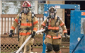 Firefighters Outside House