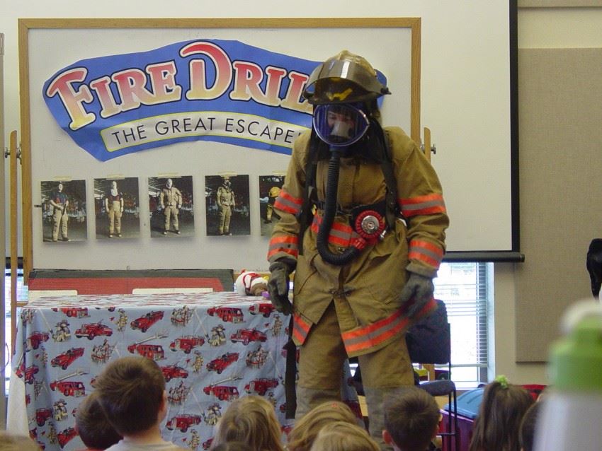 Firefighter Presenting to Children