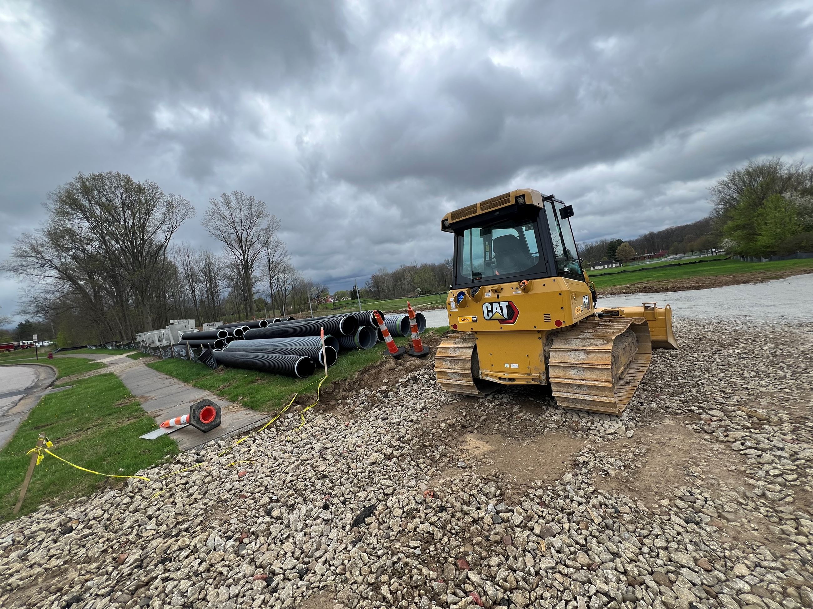 Parking lot backhoe